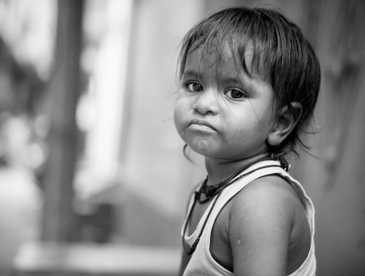 grayscale-photo-of-child-frowning-1339417