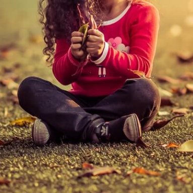 photo-of-kid-playing-with-fallen-leaves-2094741